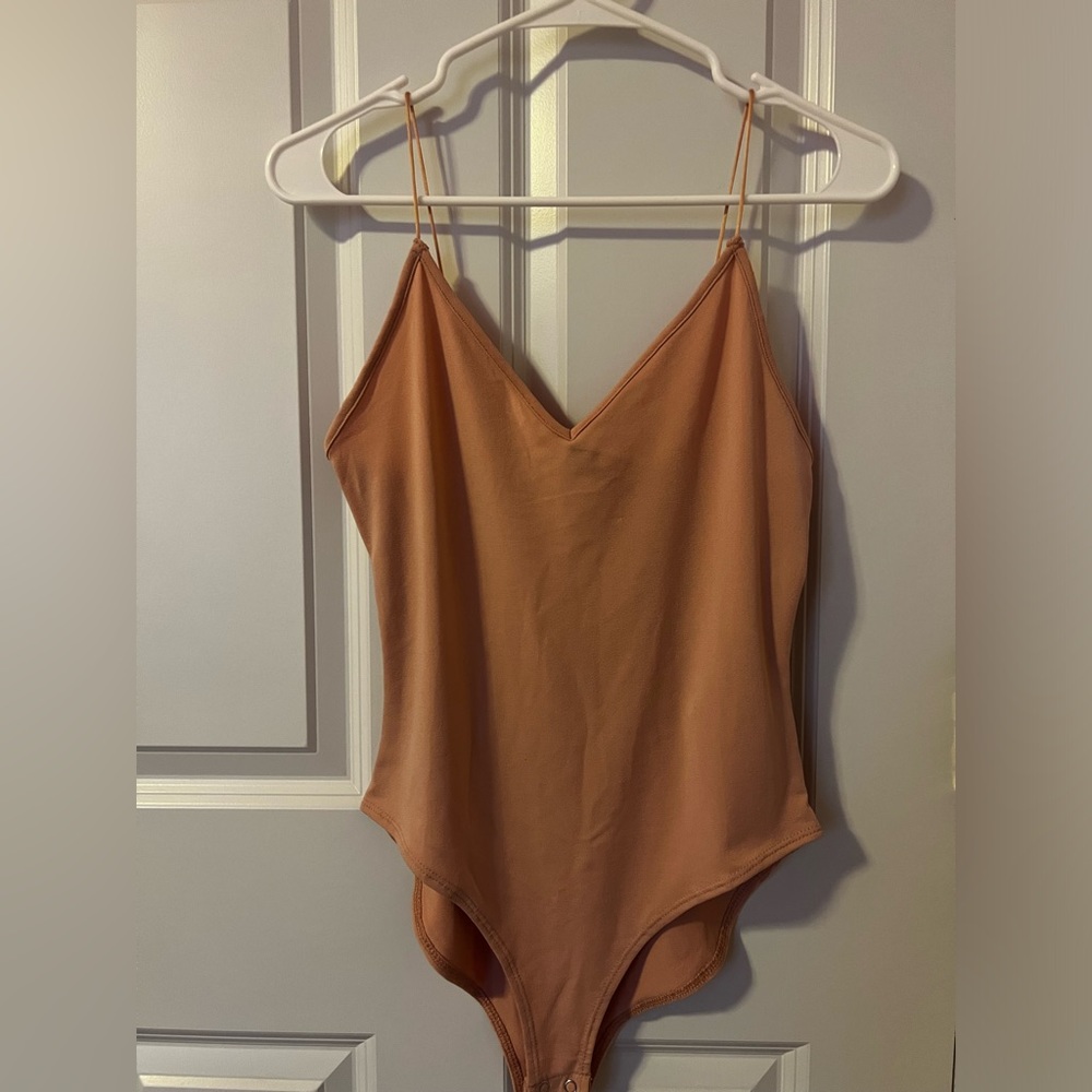 Forever 21 Nude/Peach Bodysuit in Size M